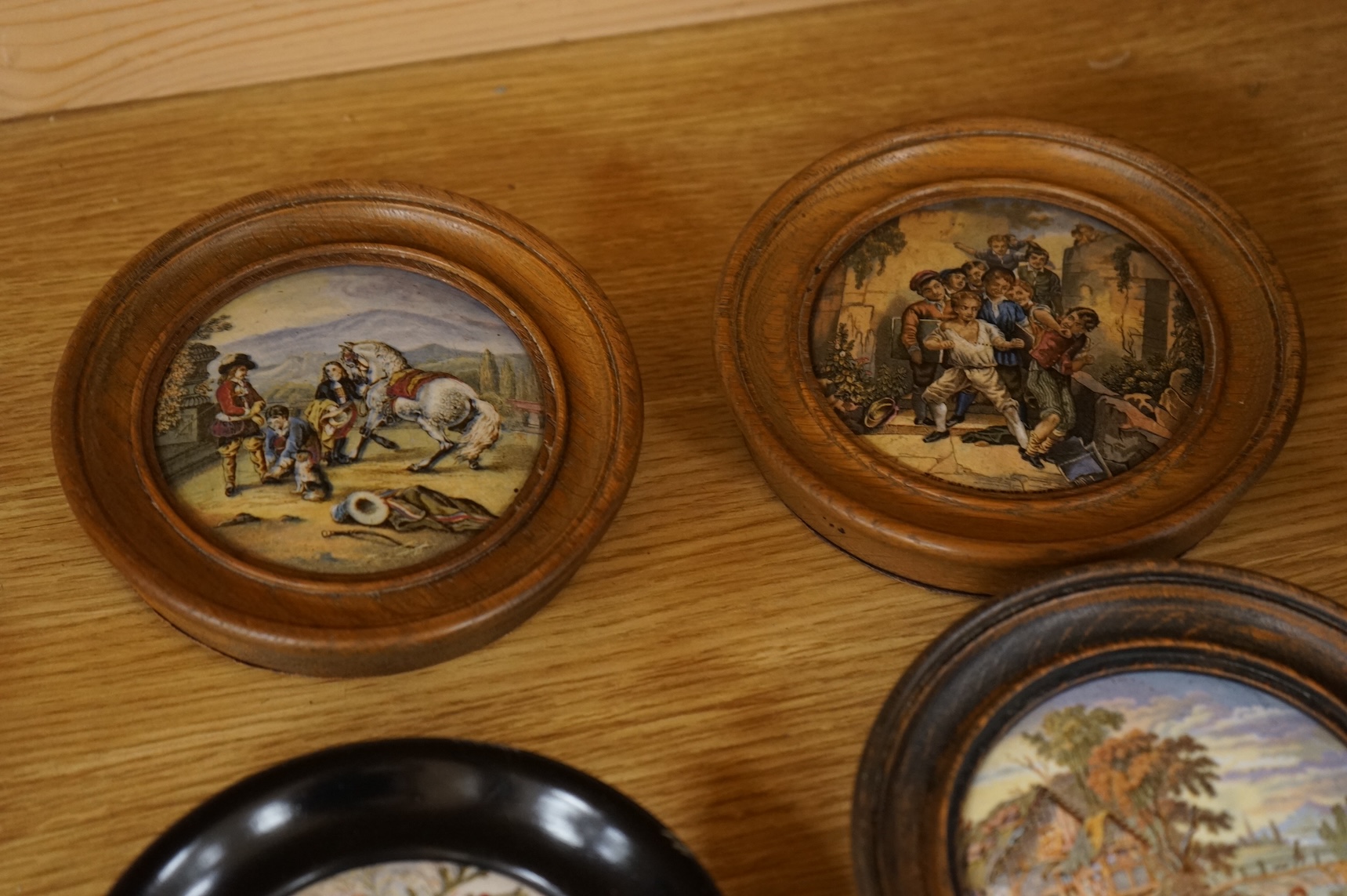 Ten various pot lids, including a rectangular shaped pot lid and frame; Wouvermann Pinx. 15cm wide not including frame.